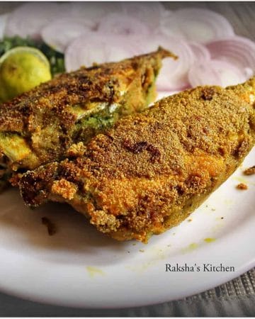 Close-up of coconut chutney stuffing inside mackerel, bharillo bangdo recipe
