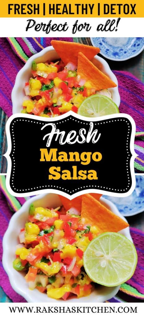 Close-up of colorful mango salsa served with nachos on a wooden table.