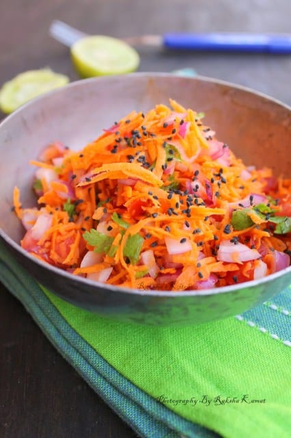 Grated carrot , tomato, onion salad with chia seeds