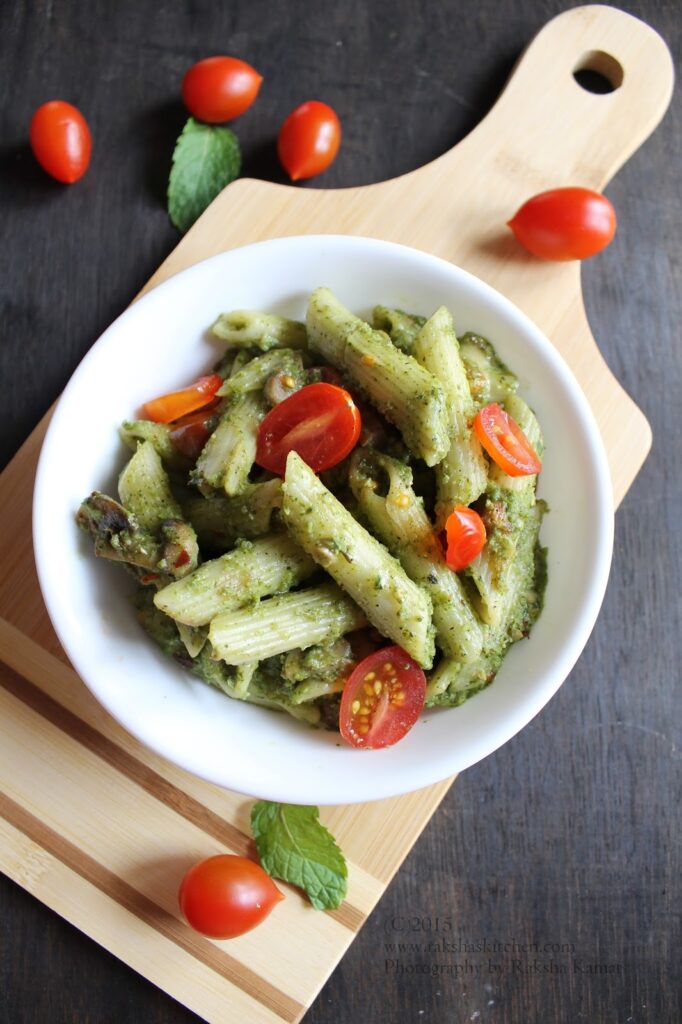 Pesto pasta with mushrooms and cherry tomatoes