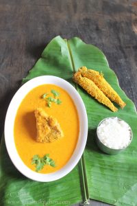 Traditional Goan Pearl Spot Curry (Kalundar Curry) served with rice and salad