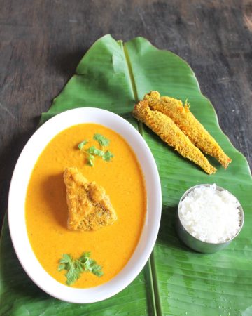 Traditional Goan Pearl Spot Curry (Kalundar Curry) served with rice and salad