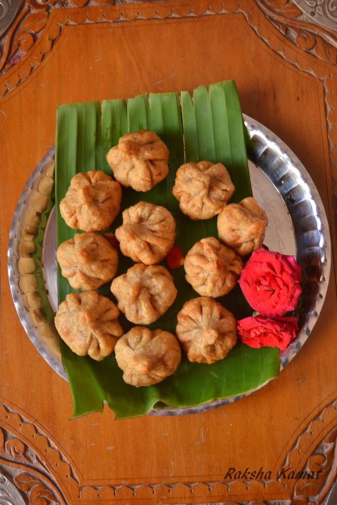 Deep Fried Modak Recipe modak, Deep fried modak, Indian dumpling with grated coconut and jaggery