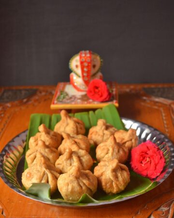 modak, Deep fried modak, Indian dumpling with grated coconut and jaggery
