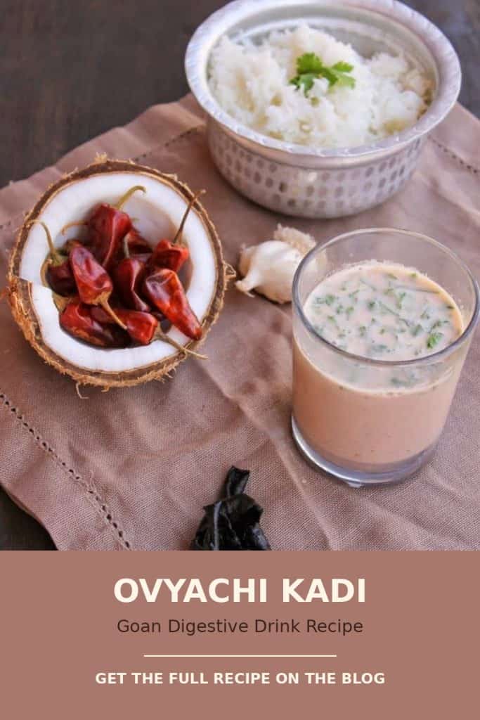 Ovyachi kadi kokum drink with ajwain served in a glass alongside steamed rice and dried kokum petals